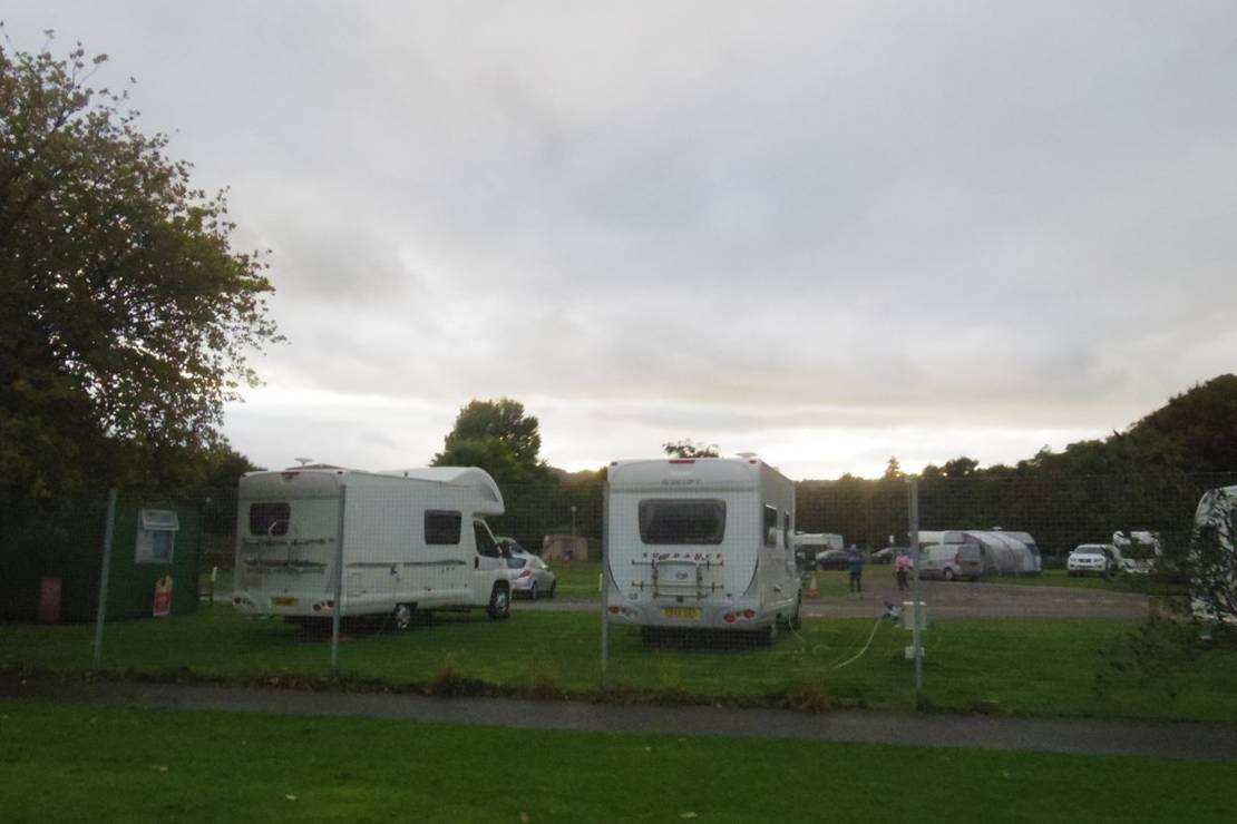 How far from the river is Bught Caravan Park?
