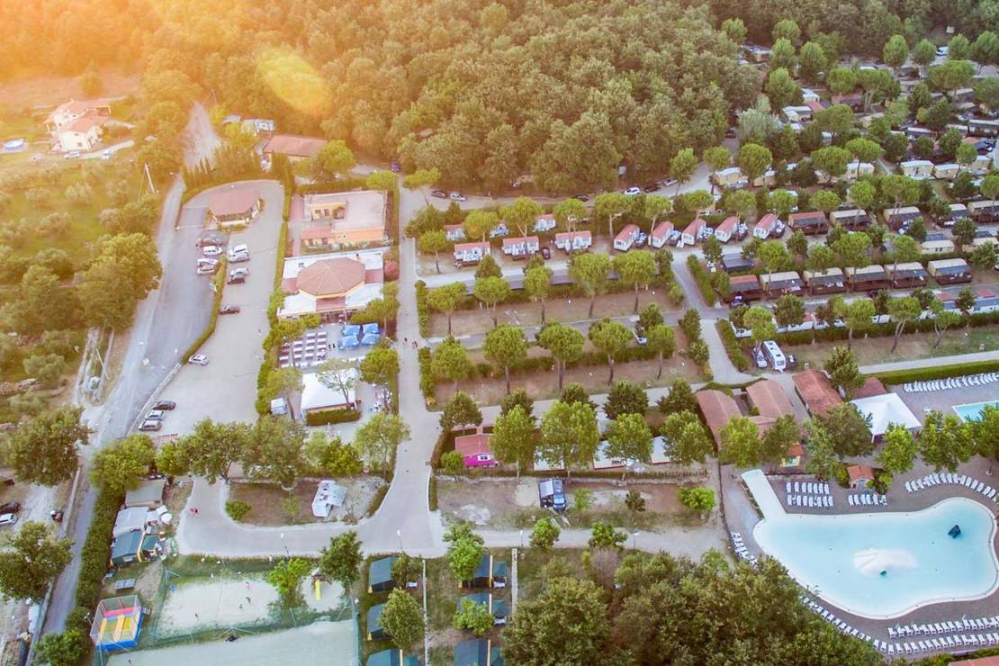 How far from the river is hu I Pini Village?