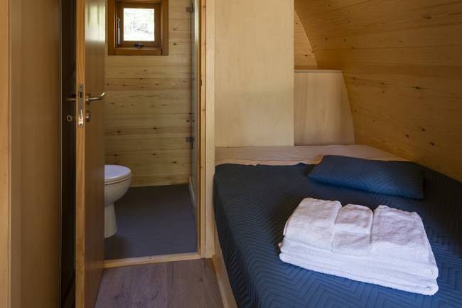 Cabana Pod com roupa de cama